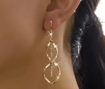 Shine Boldly – Golden Infinity Drop Earrings
